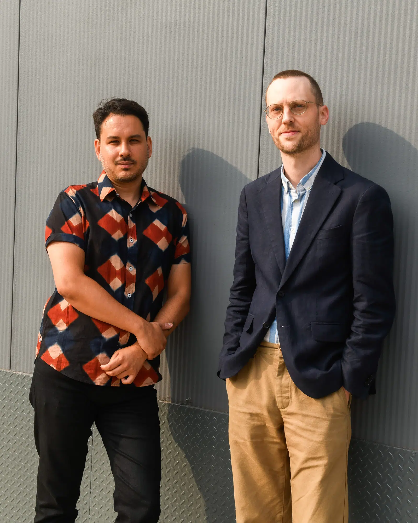 Artist Suneil Sanzgiri and curator Drew Sawyer at the UOVO Prize mural event in Brooklyn.