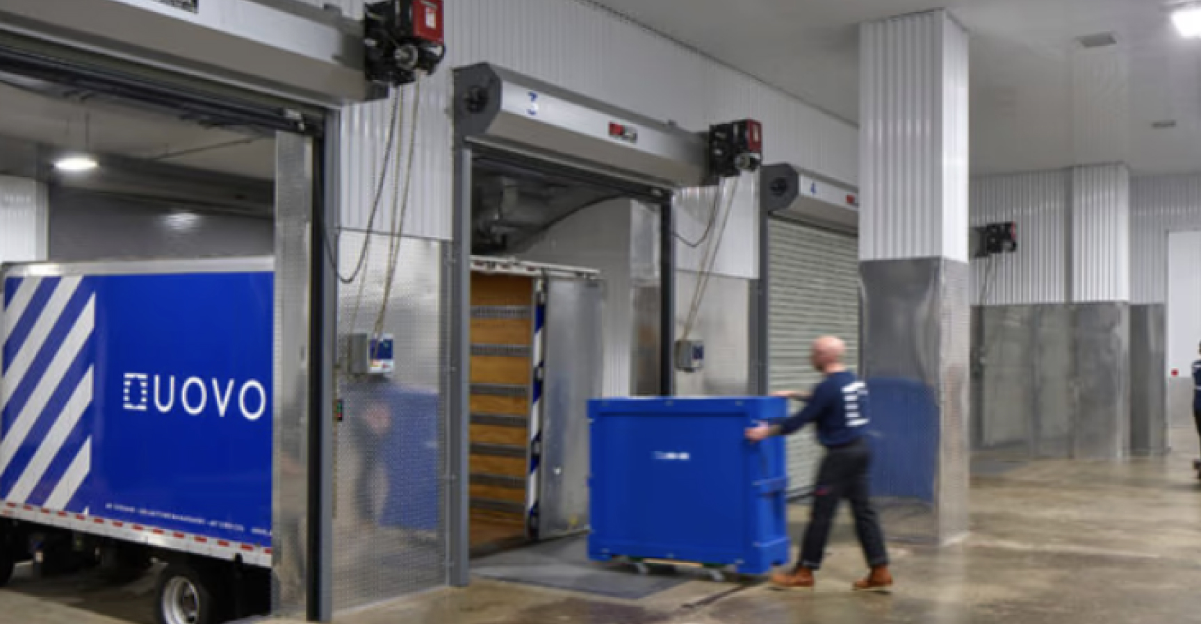 UOVO art handler loading a crate into a truck.