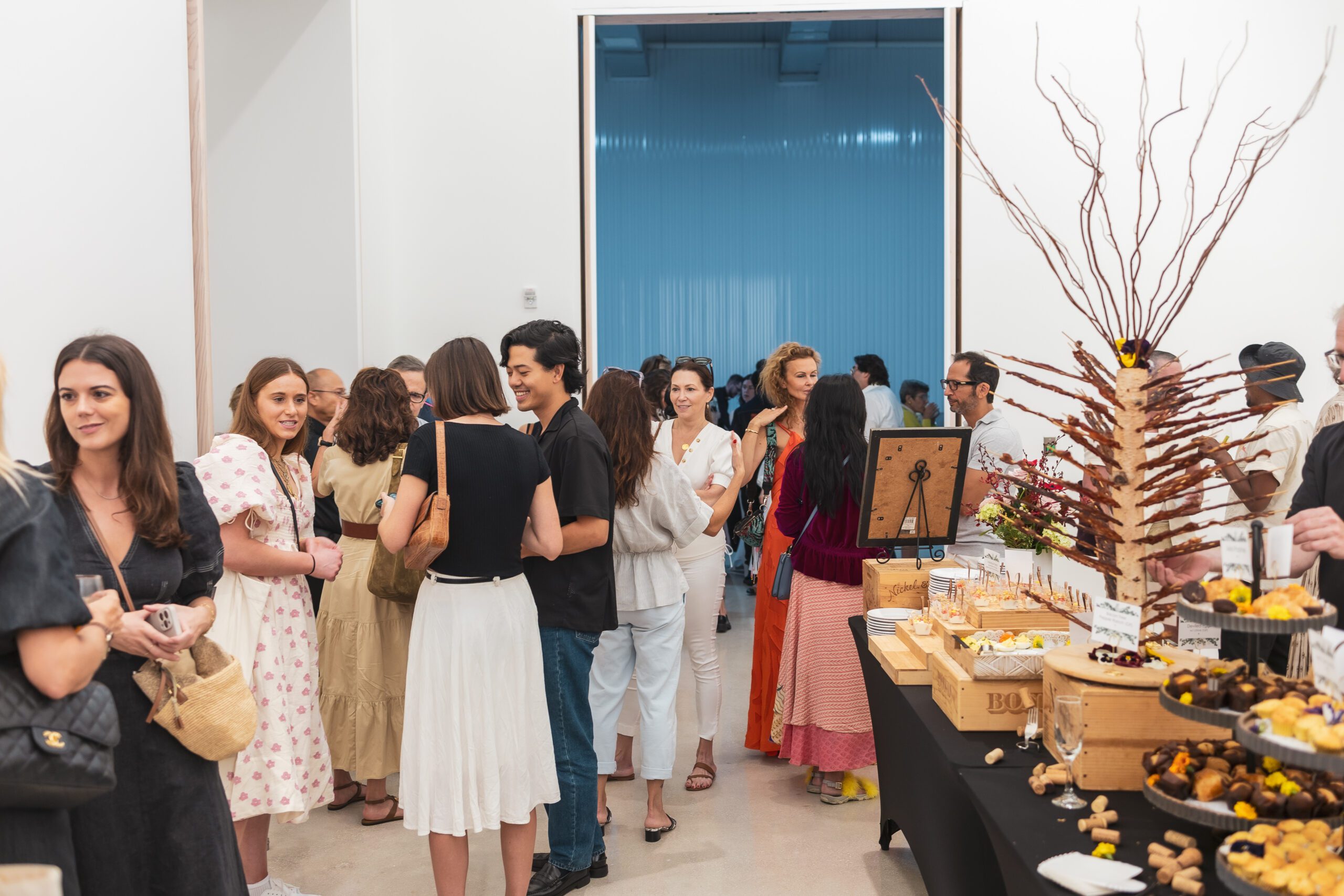 Reception area at New Wave Art Wknd, hosted at UOVO's facility in West Palm Beach. 