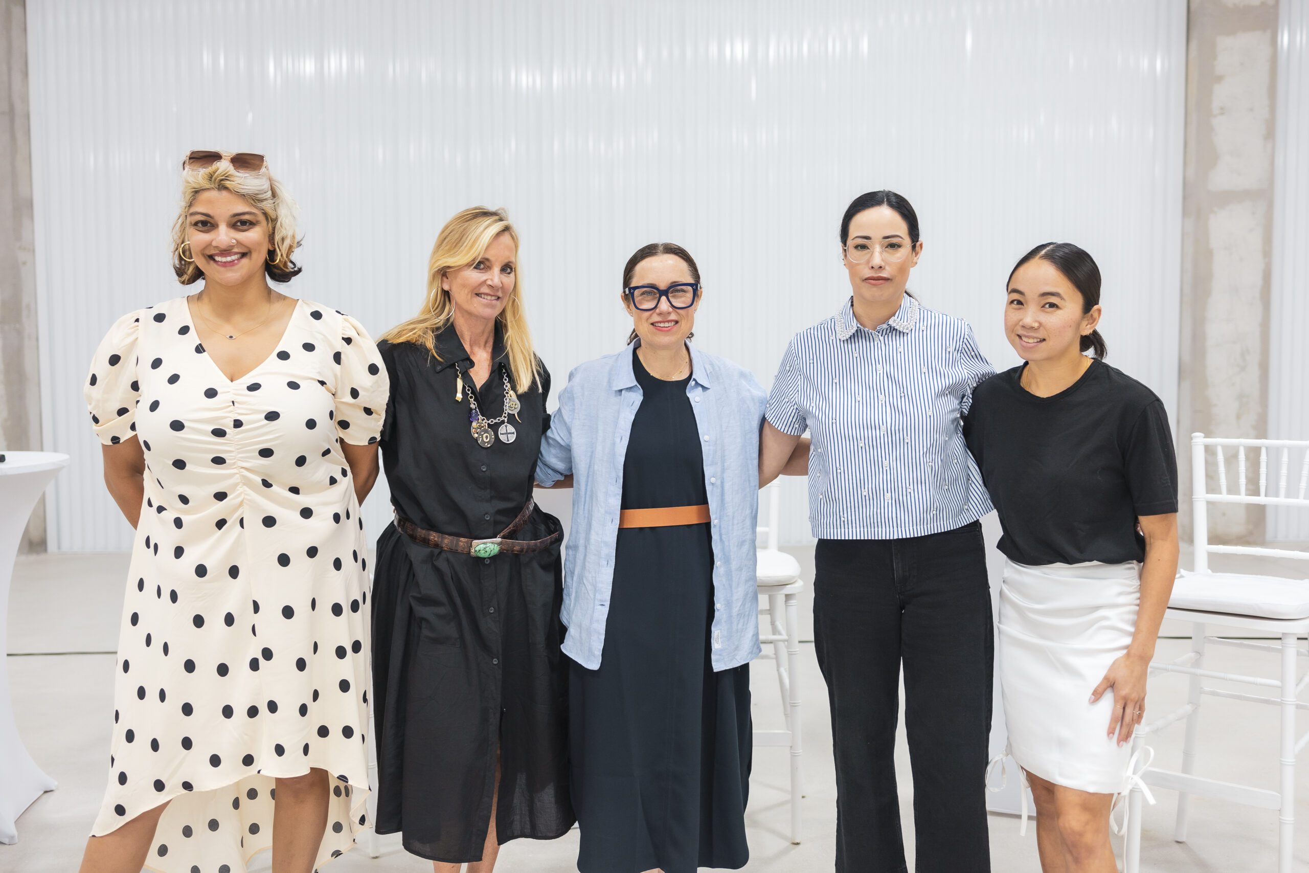 Five art world leaders pose together at New Wave Art Wknd panel discussion hosted by UOVO.