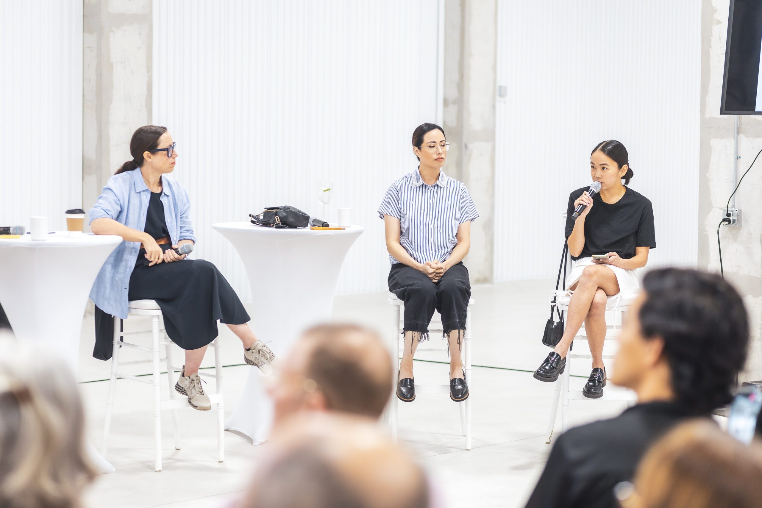 Three panelists in discussion at New Wave Art Wknd’s public panel.