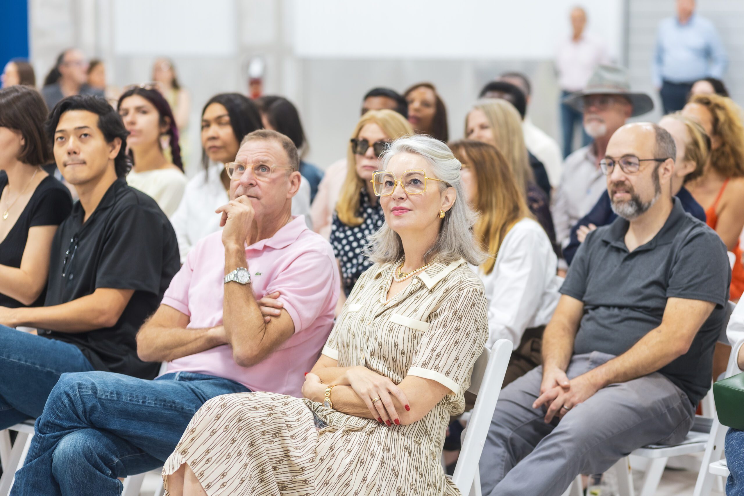 Audience members listening to speakers at UOVO's and New Wave Art Wknd panel discussion.