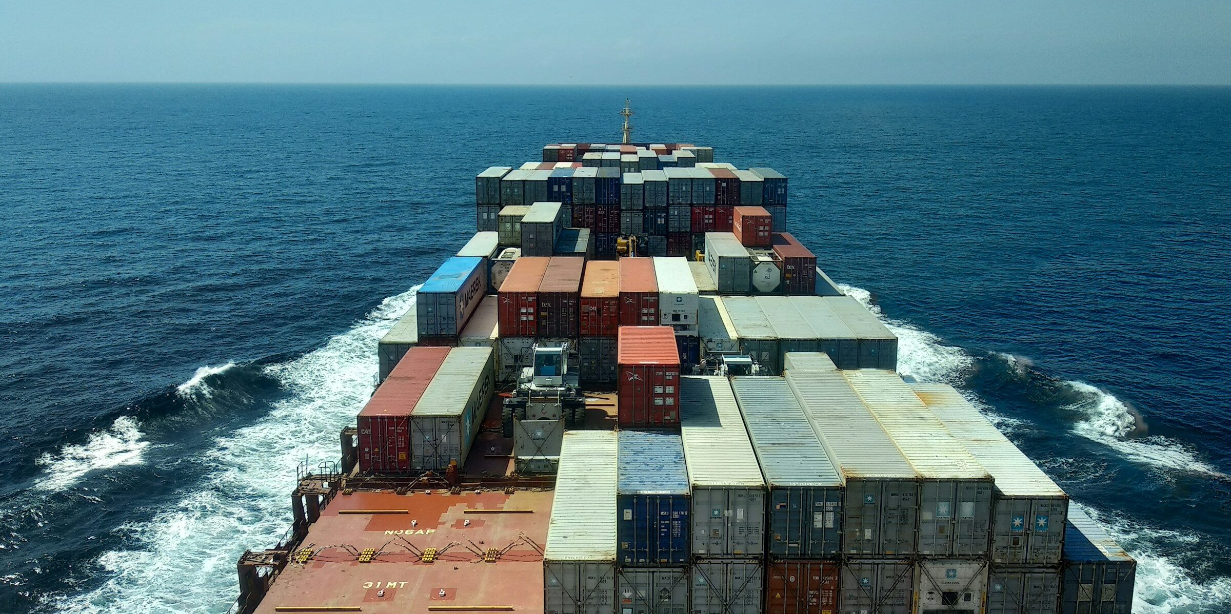 Crates of Wine Being Shipped in a Boat Across the Ocean