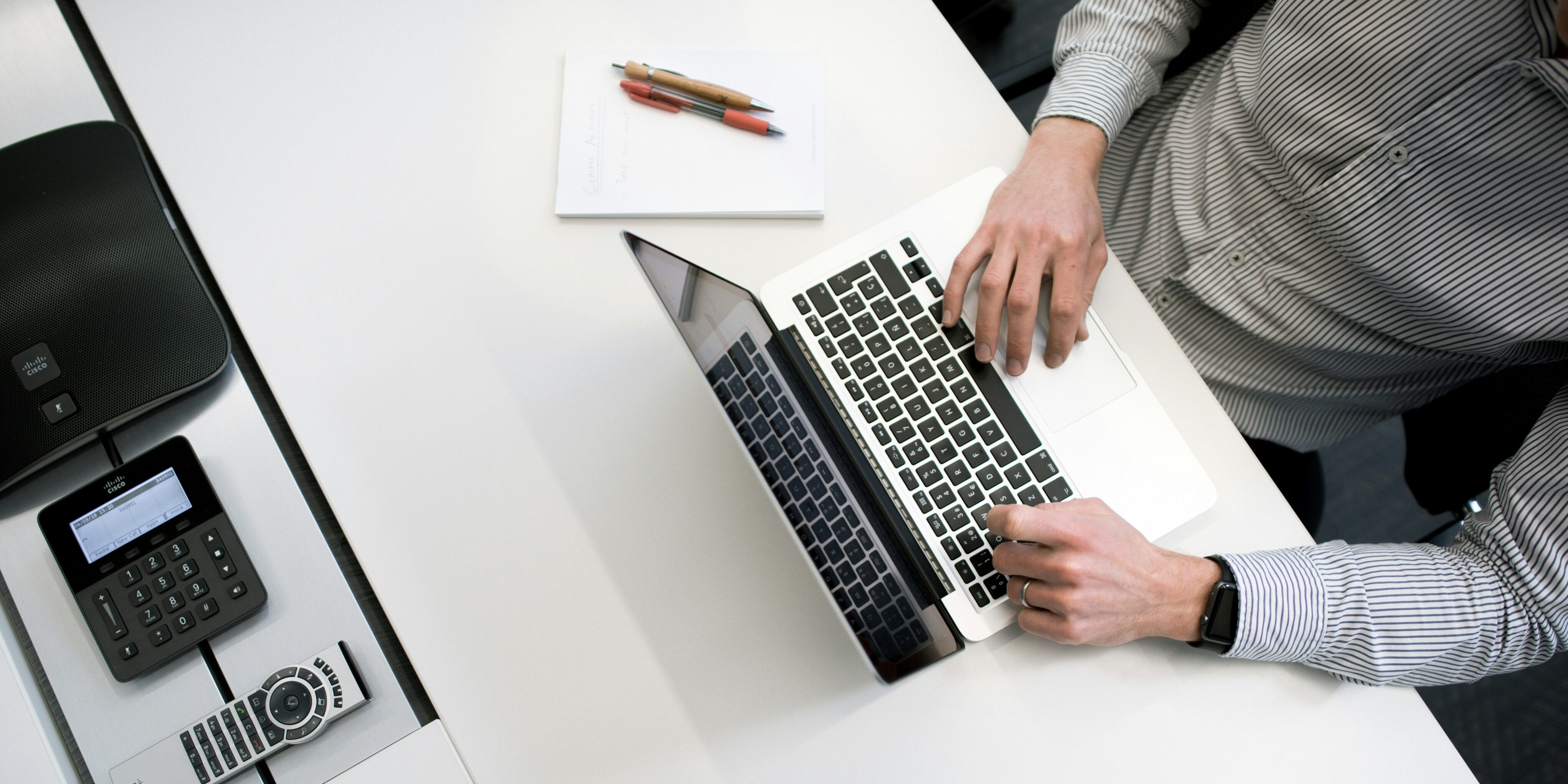 Person Working on Laptop