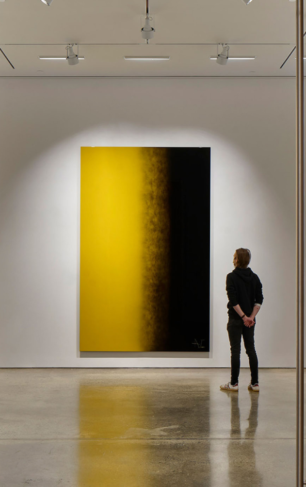 Person Viewing UOVO Art At Viewing Gallery