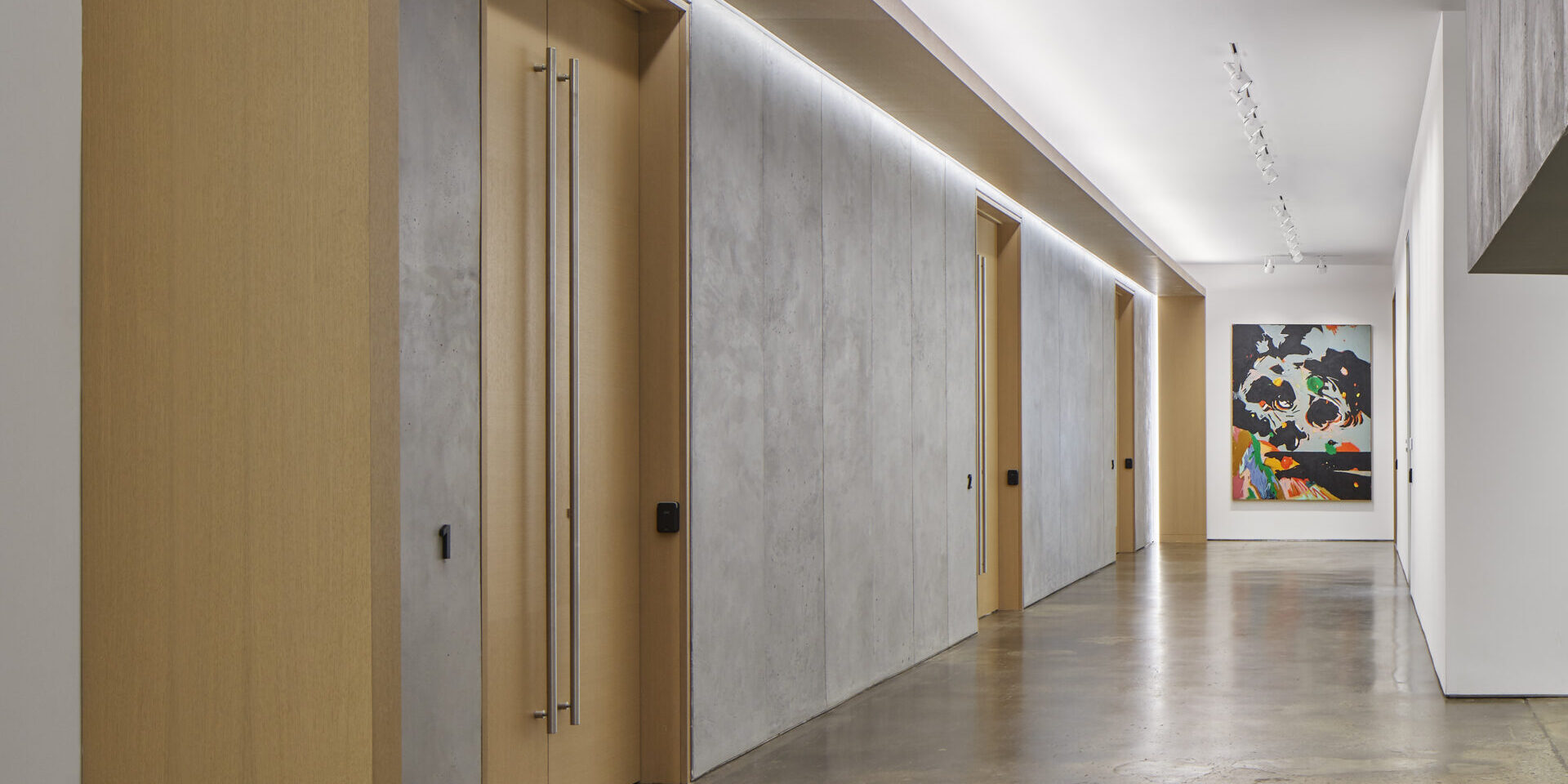 Hallway in UOVO Building with Art on Wall