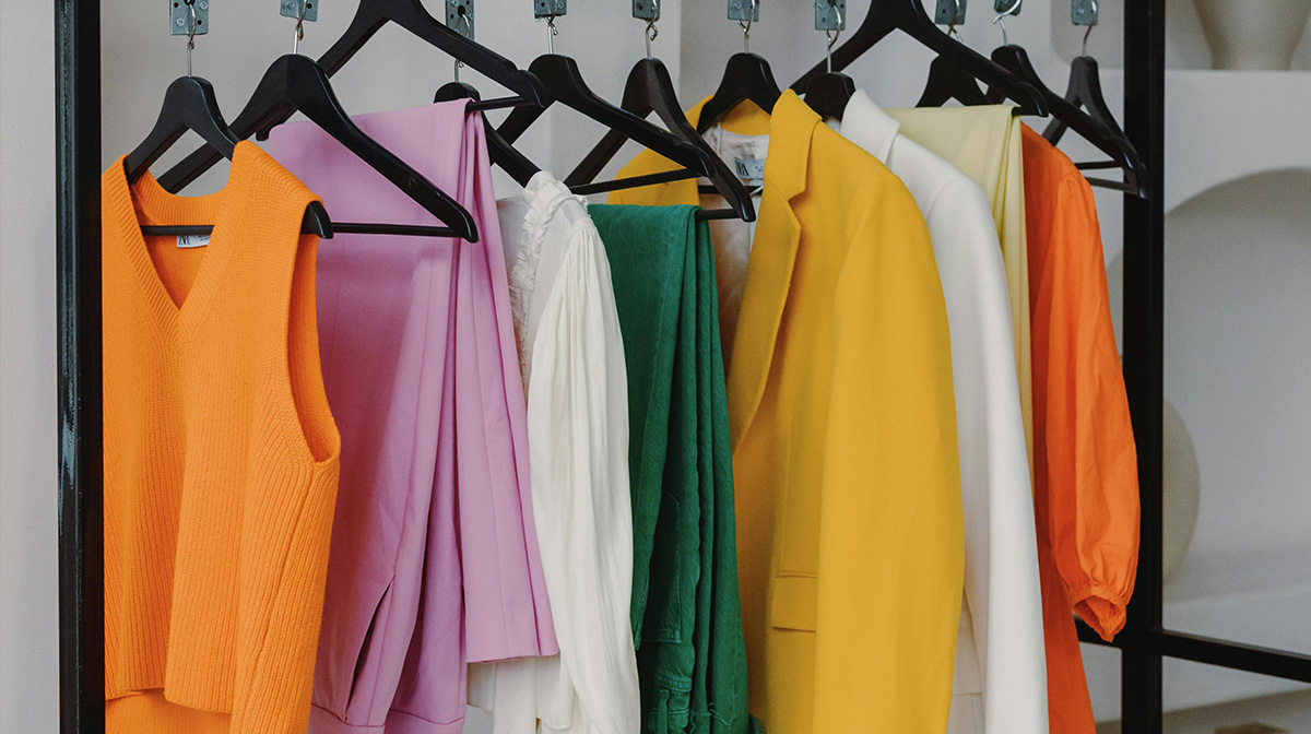 Colorful Clothing Hanging on a Rack
