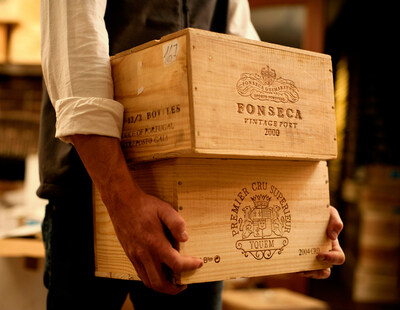 UOVO Wine employee handling a client's collection.