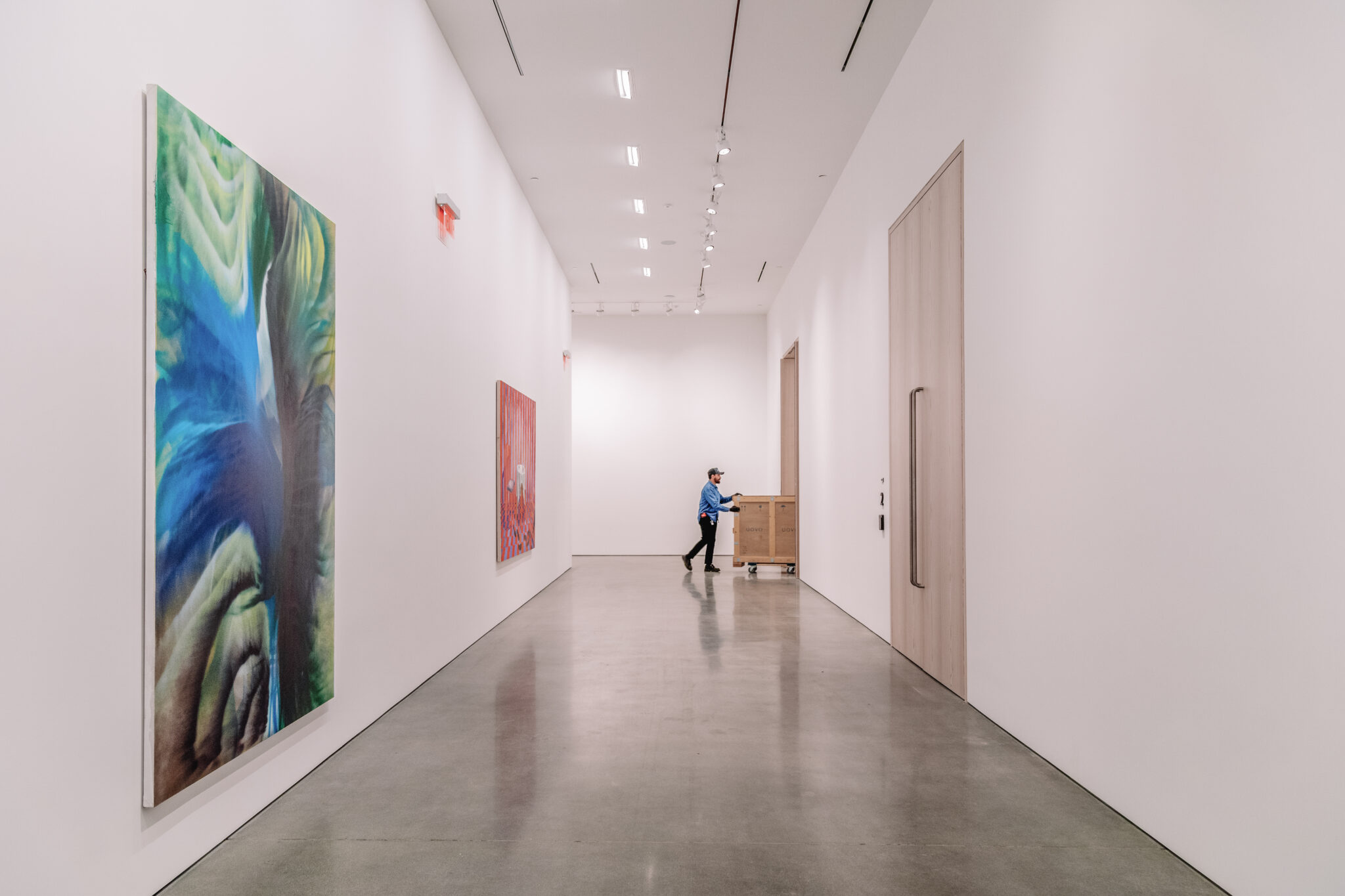 Hallway of Artwork at UOVO California Location