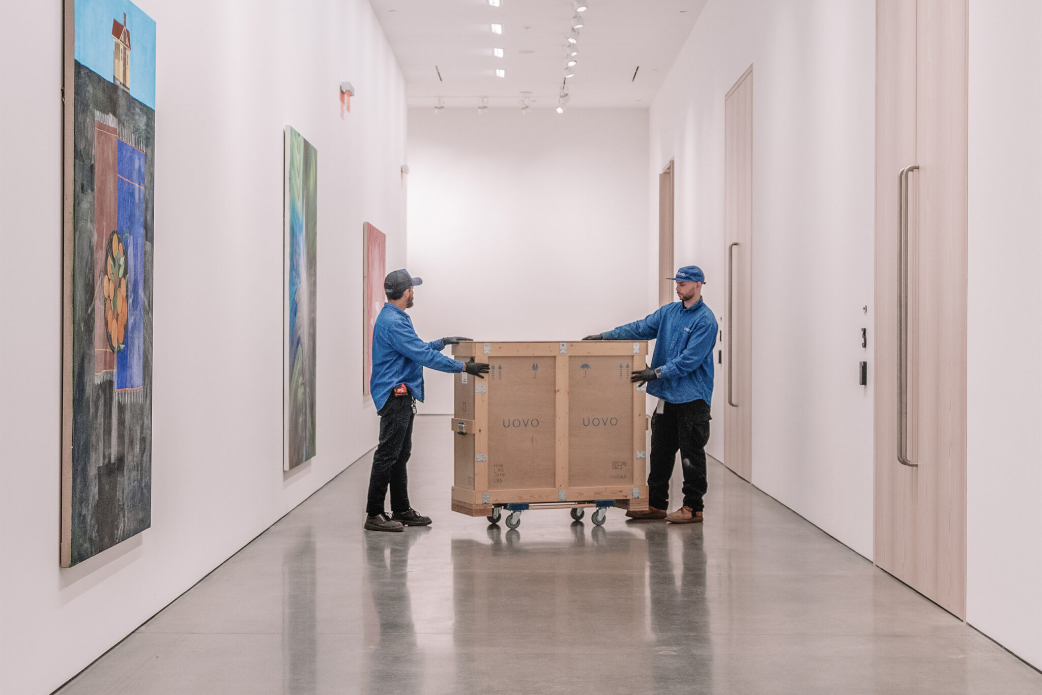 UOVO Staff Moving Art in Crate