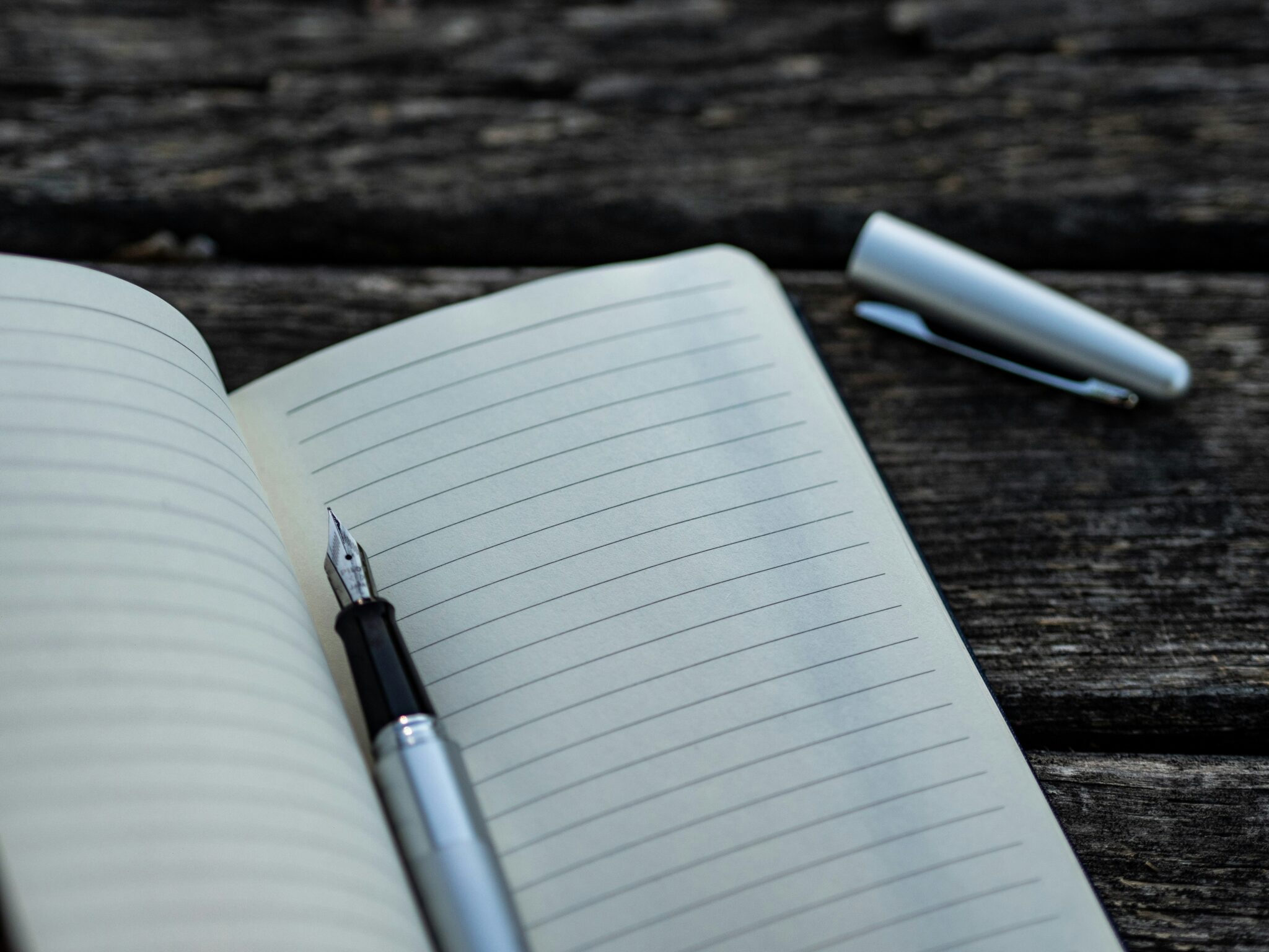 notepad with a pen.