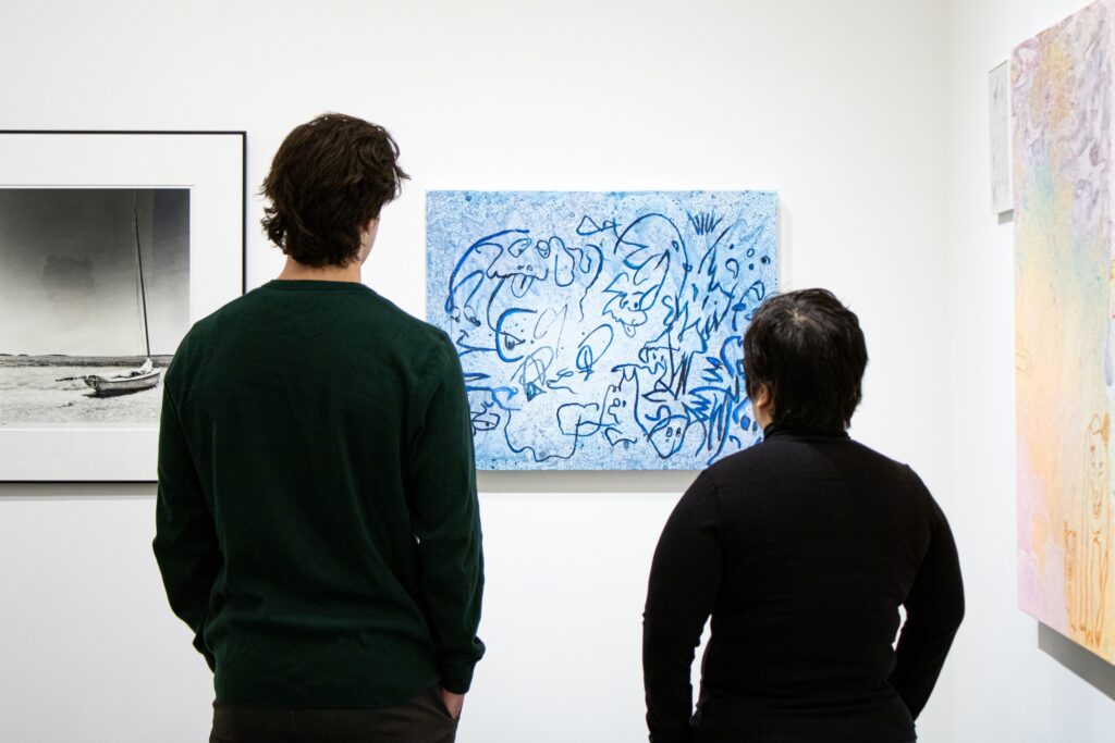 UOVO's viewing gallery displaying pieces of art for the company's annual Staff Art Show.