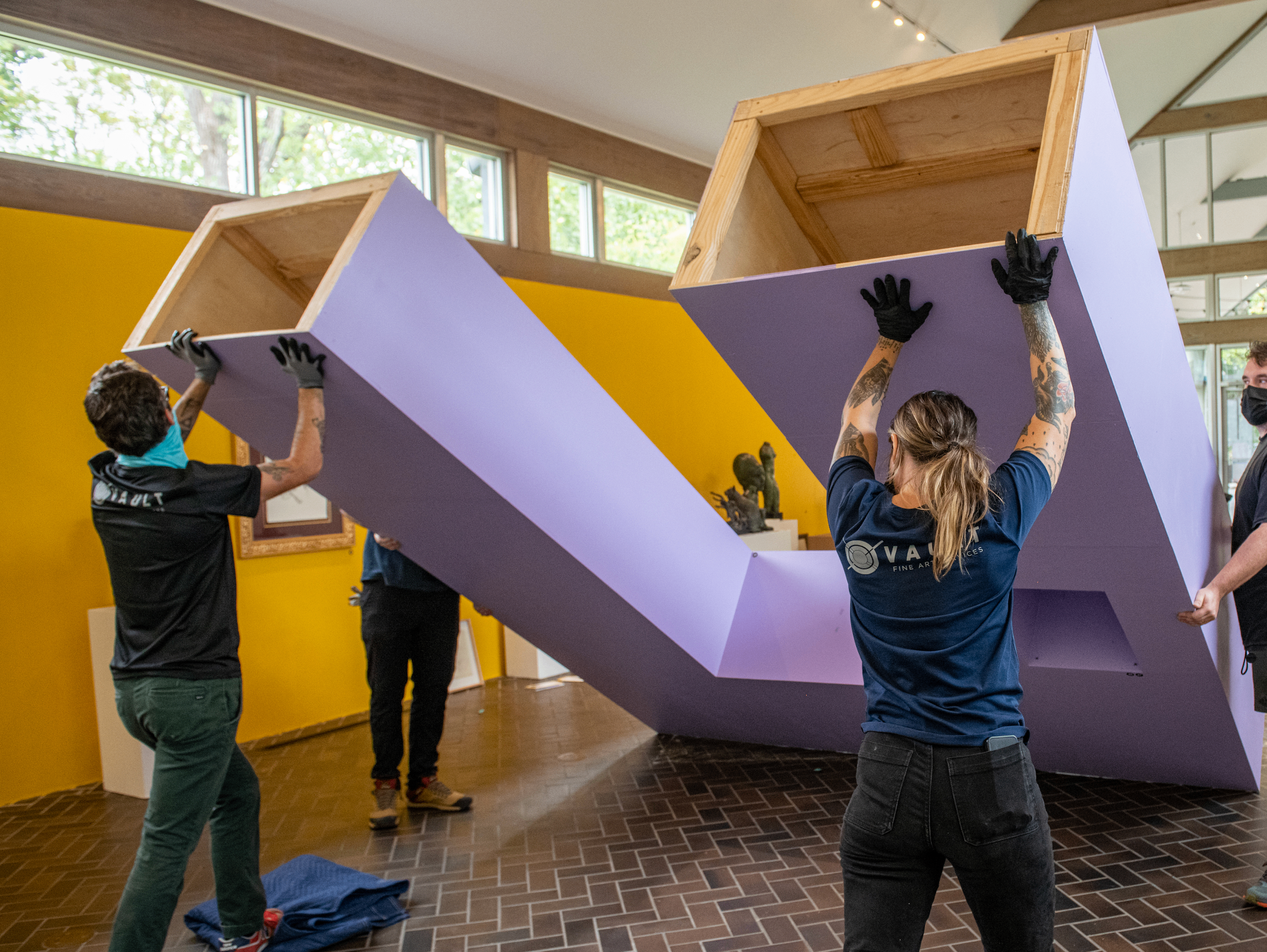 Vault Fine Art Service team working on an installation.